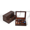 Dunkelbraune Leder-Uhr-Präsentationsbox mit Glasdeckel, die mehrere Armbanduhren zeigt.