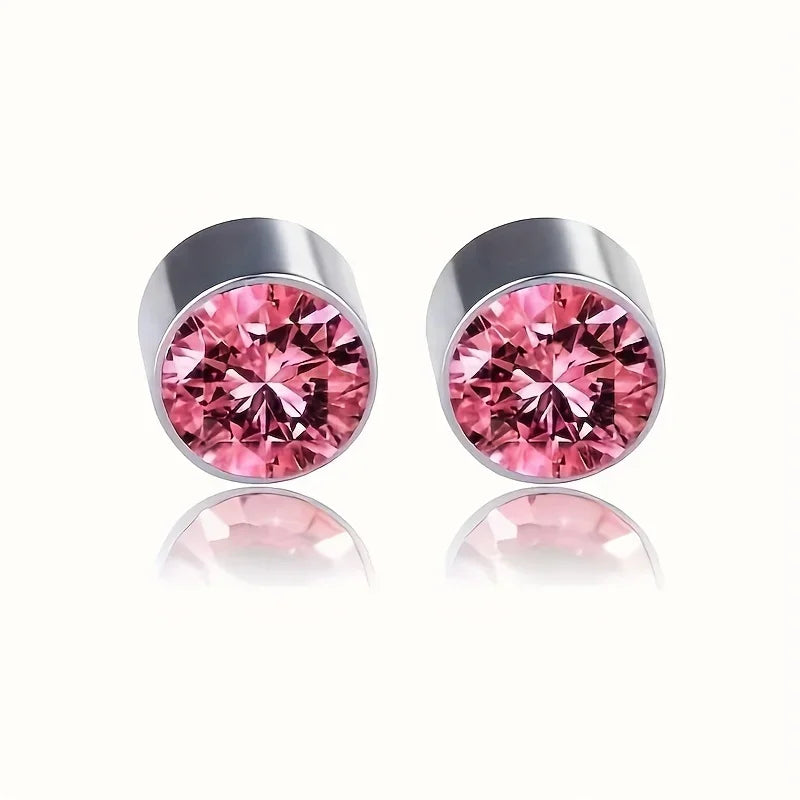 A pair of magnetic nose stud earrings made of stainless steel and cubic zirconia in a pink color.