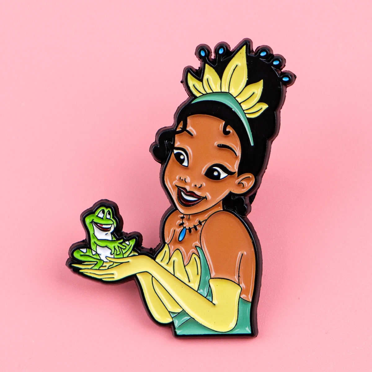 A colorful enamel pin featuring a smiling woman with bright yellow hair and green clothing.