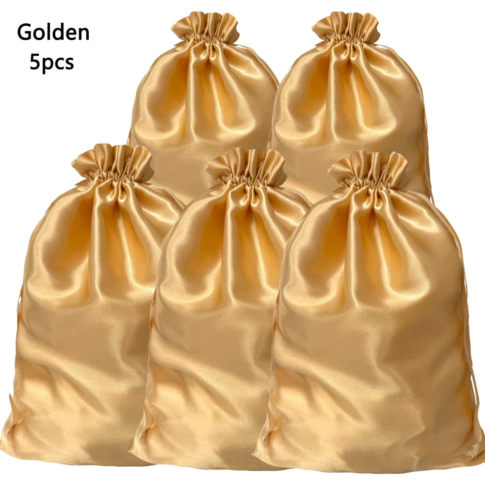 Five golden satin drawstring storage bags for hair tools