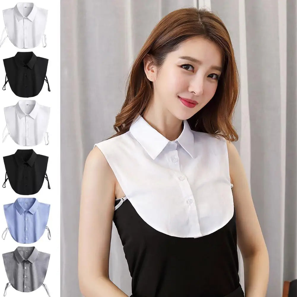 A woman models a white universal fake collar shirt worn over a black top.