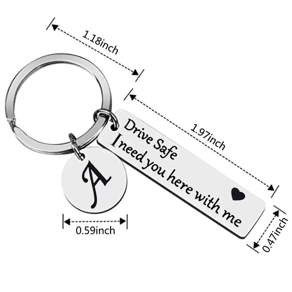 Silver keychain with a circular ring and a rectangular tag engraved with the letter A