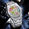 A silver retro luminous quartz wristwatch with a colorful floral dial and metal bracelet.