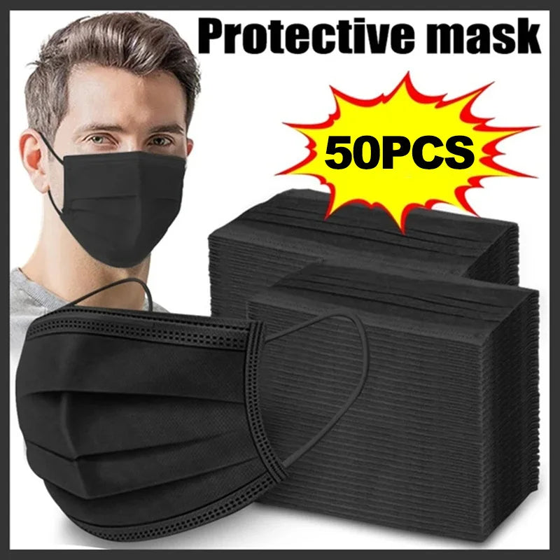A man holds a stack of black protective face masks with a yellow starburst graphic indicating 50 pieces.