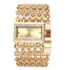 A gold stainless steel fashion quartz diamond watch with an ornate bracelet and square case.