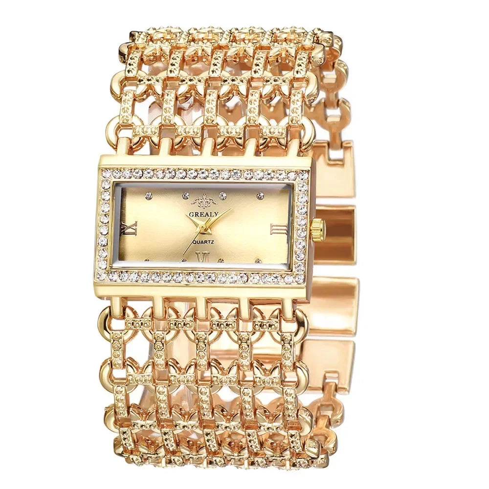 A gold stainless steel fashion quartz diamond watch with an ornate bracelet and square case.