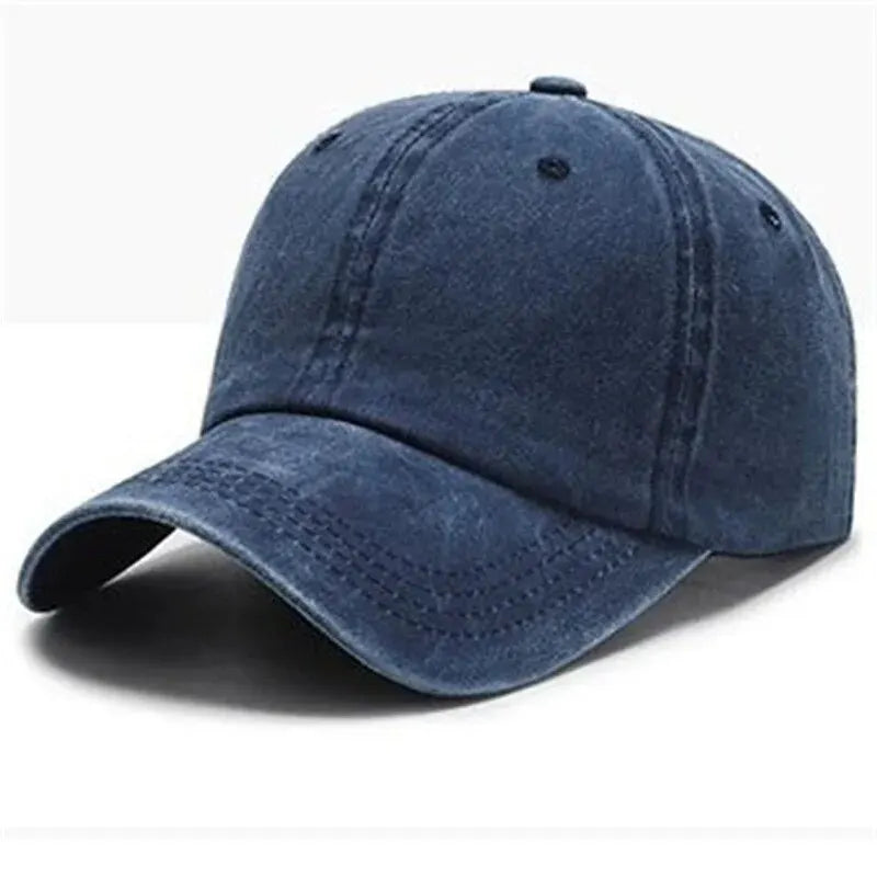 A dark navy blue casual baseball cap shown from above, featuring a curved brim and a mesh back.