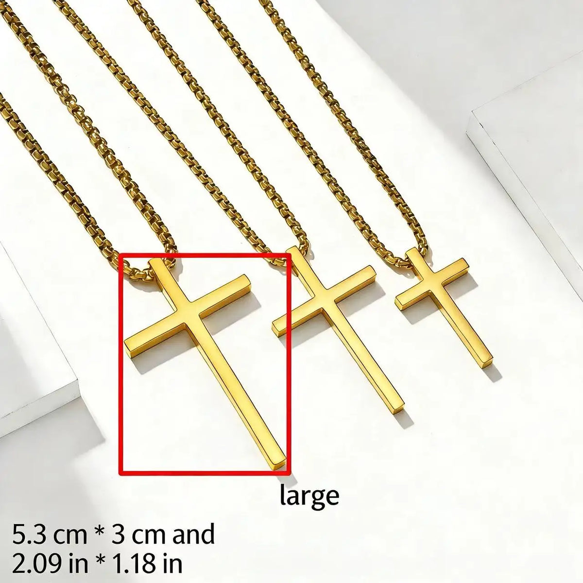 Gold stainless steel cross pendant necklace for men displayed on a white background
