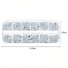 A rectangular plastic tray containing 12 small clear compartments filled with silver and black rhinestones for nail art decor