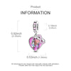 Sterling silver star moon charm bracelet featuring a heart pendant with a small figure.