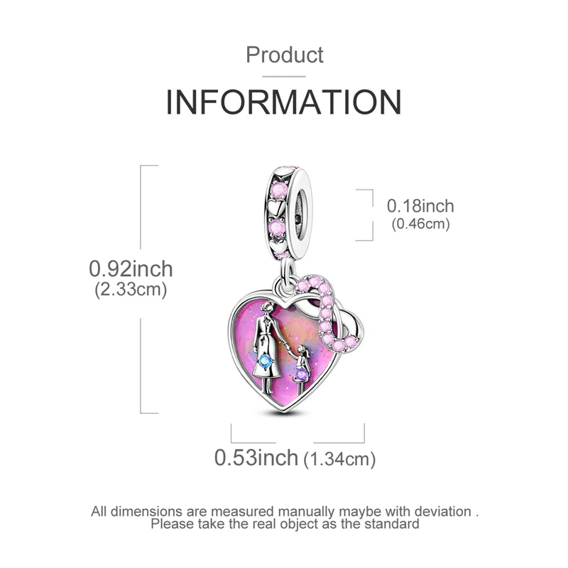 Sterling silver star moon charm bracelet featuring a heart pendant with a small figure.