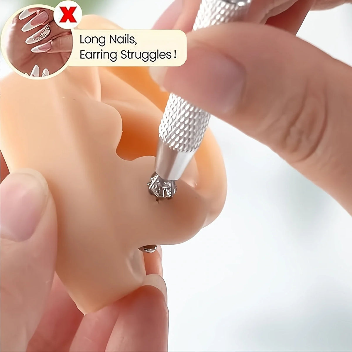 A hand is using a titanium piercing tool to perform a nose piercing on a model.