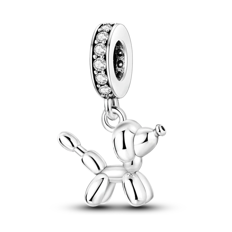 Sterling silver devil's eye charm bracelet featuring a round gemstone and a charm shaped like a stylized animal.