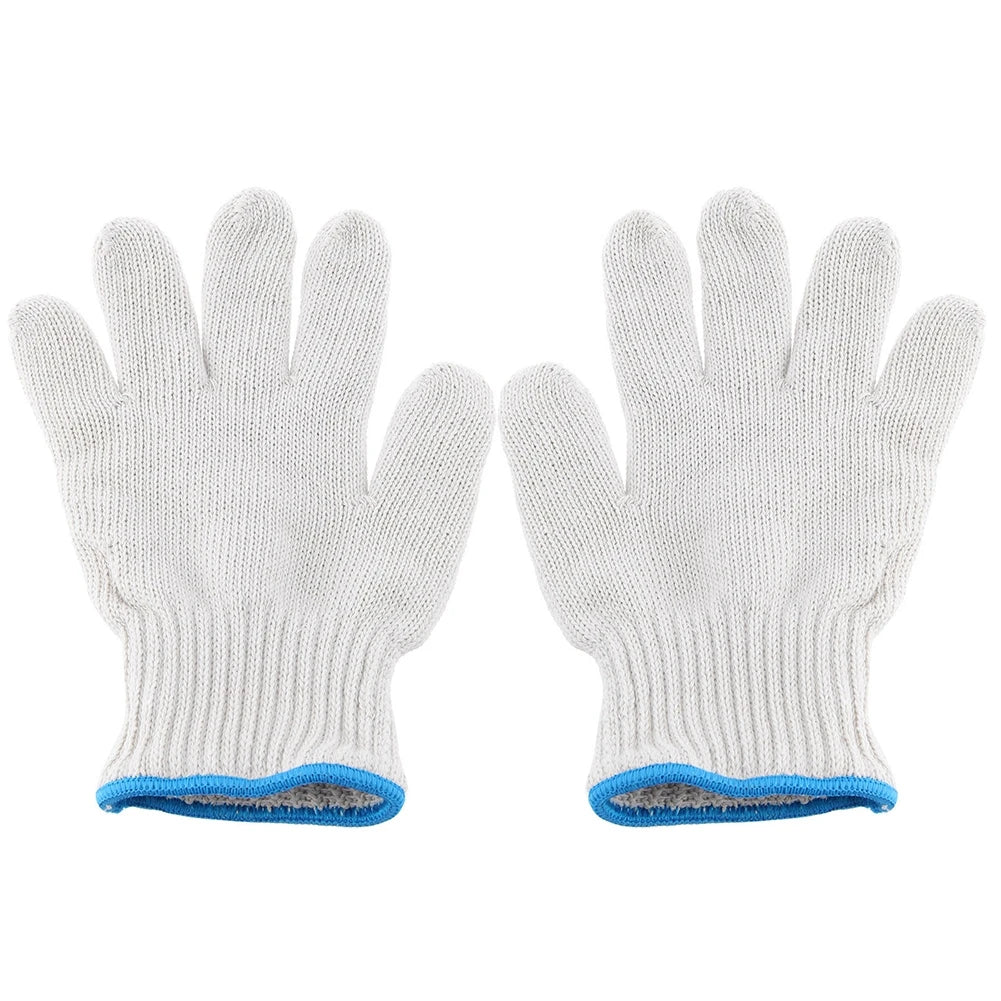 A pair of white cotton thread work gloves with blue trim.