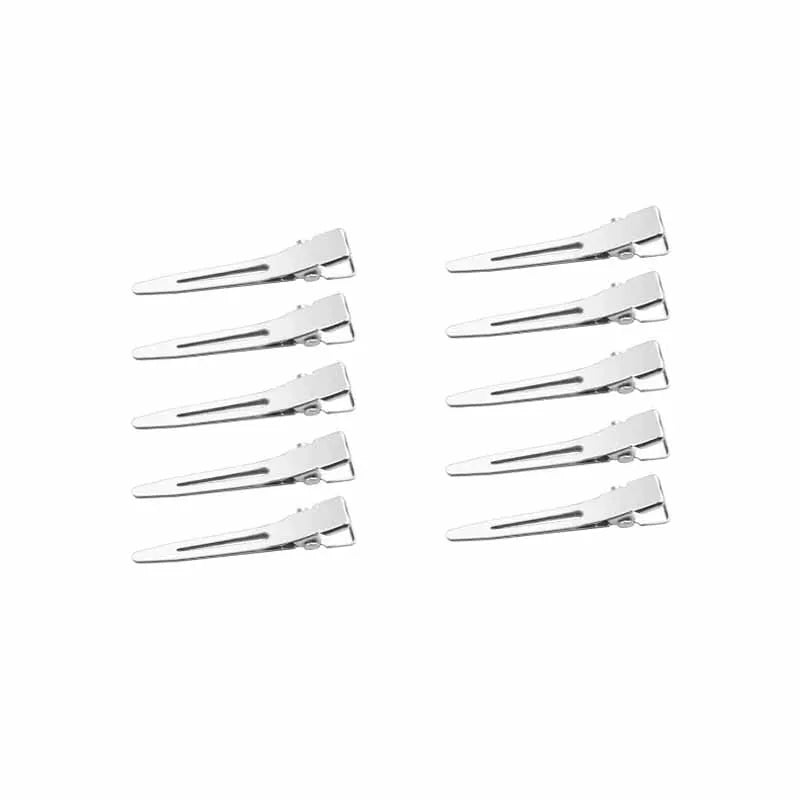 A set of professional fixed hair pins used for styling.