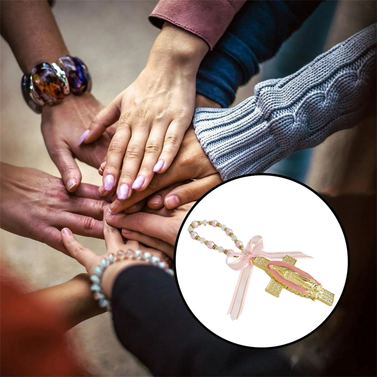 Hands joining together to display a gold and pink Virgin Mary Saint Jude Protection Catholic charm.