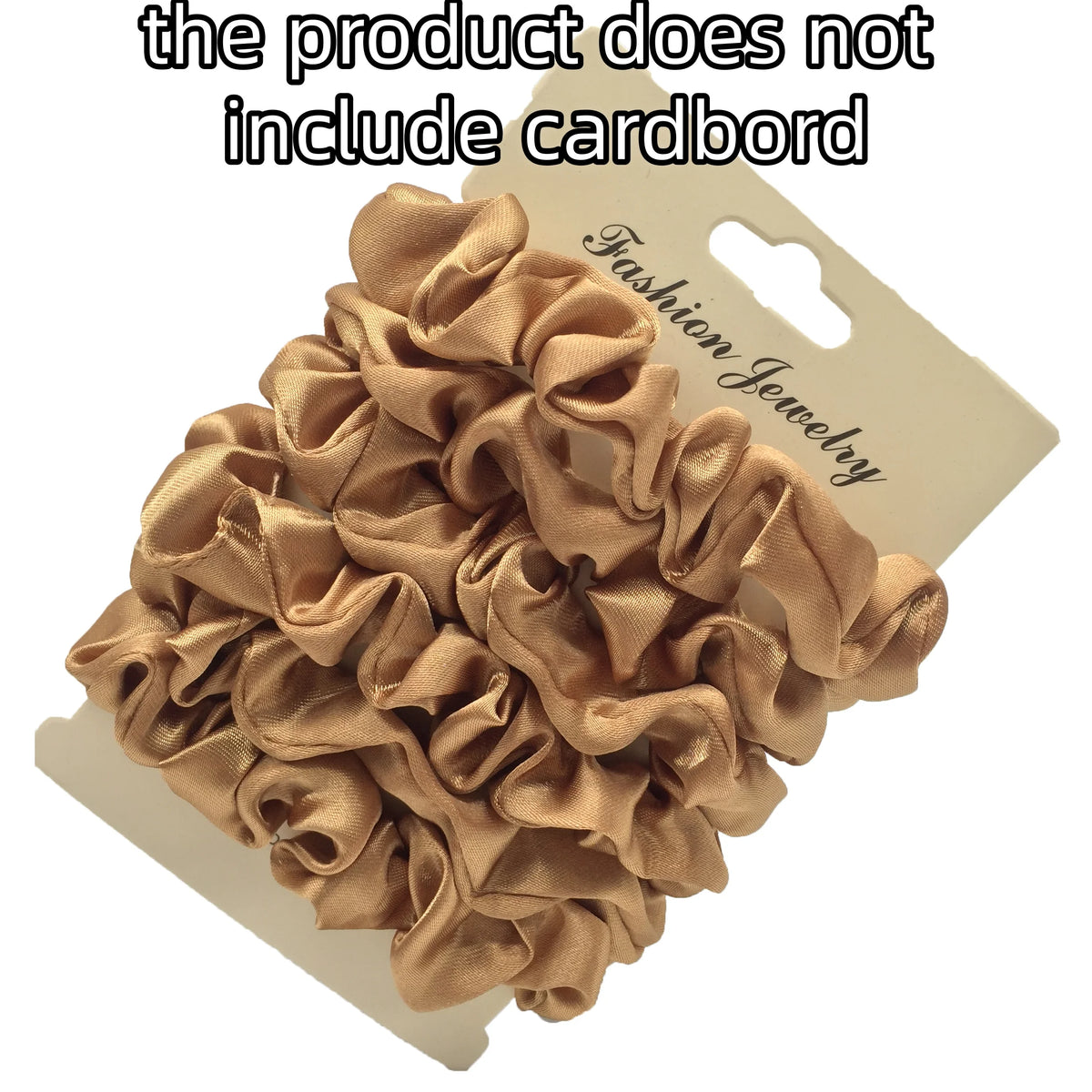 A pile of satin hair scrunchies in a golden beige color displayed on a cardboard backing.