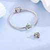 Sterling silver devil's eye charm bracelet with a heart pendant and separate charms