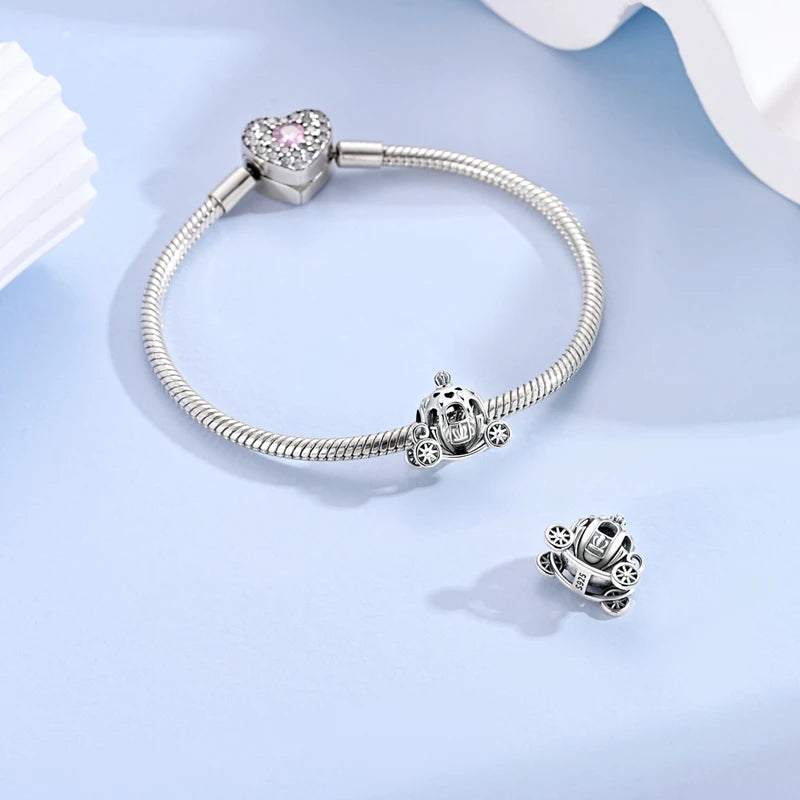 Sterling silver devil's eye charm bracelet with a heart pendant and separate charms