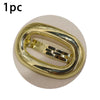 A single elegant gold metal oval hair clip shown in a close-up view.