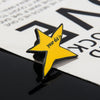 A yellow star enamel pin brooch with the text you did it on a white background.