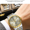 A close-up of a gold and silver luminous quartz wristwatch worn on a wrist, set against a dark background.