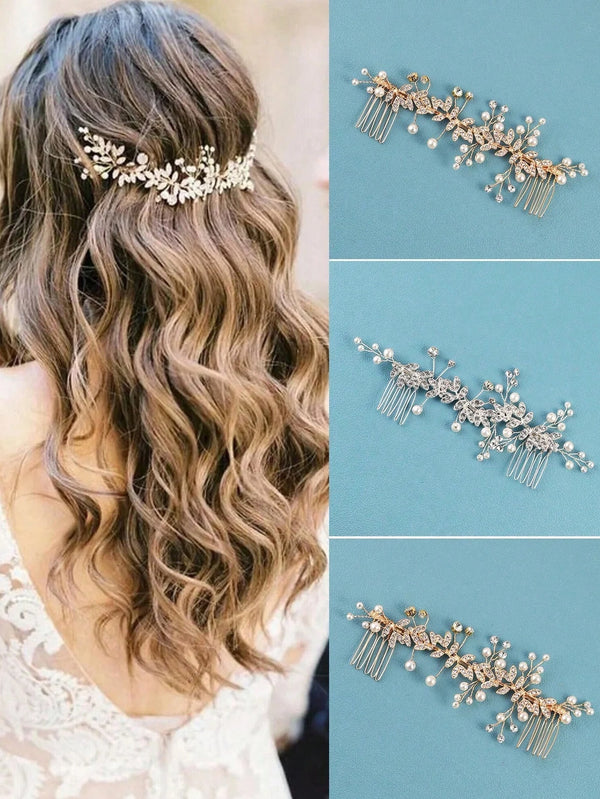 A close-up of an elegant silver leafed crystal hair comb with delicate floral accents.