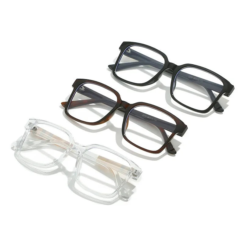 A collection of minimalist rectangular anti-blue light eyewear frames in black and brown tones.