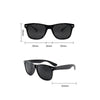 Black vision correction pinhole glasses with a perforated lens and thin frame.