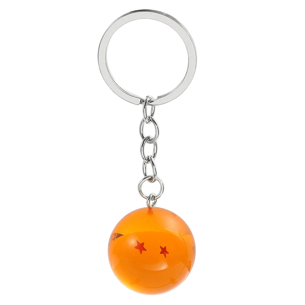 Silver hoop keychain with an orange spherical charm featuring a yellow star.