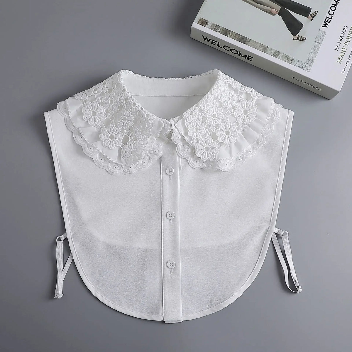 White blouse with a lace false collar and detachable neckline