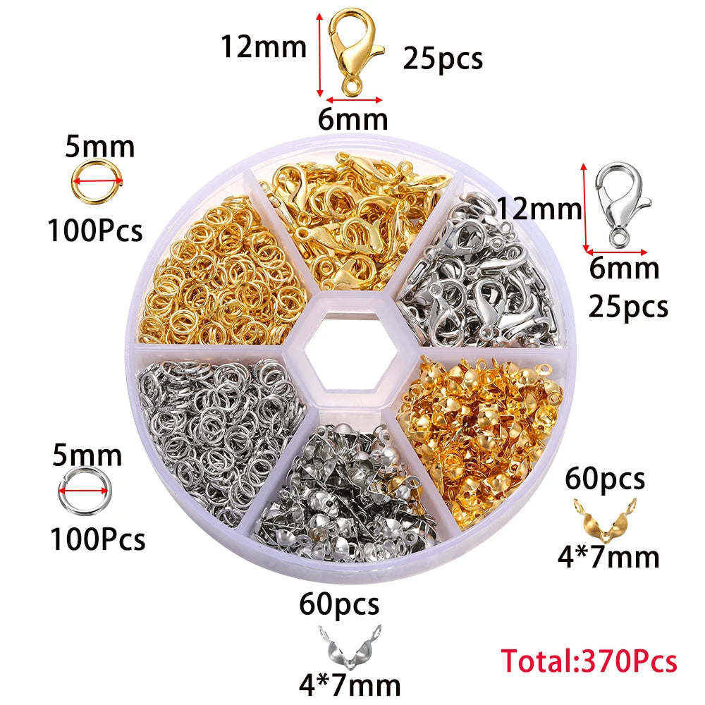 A set of jewelry findings including gold and silver clasps, hooks, and jump rings packaged in a clear plastic container.