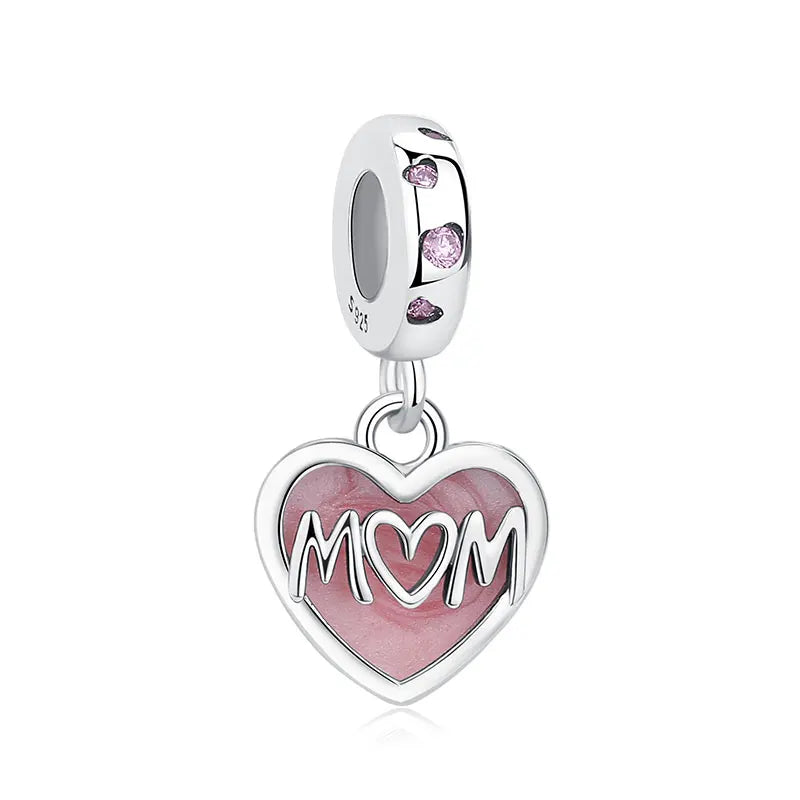 A silver heart pendant charm with a tree design and pink stones, suspended from a sterling silver chain.