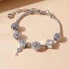 A silver multi-element beaded love bracelet set for women displayed on a neutral background.