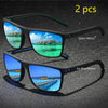 Two pairs of vintage check pattern sunglasses, one green mirror and one ice blue mirror.