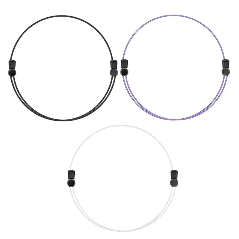 Three adjustable crop tuck bands for shirts and sweaters shown in black, purple, and white.