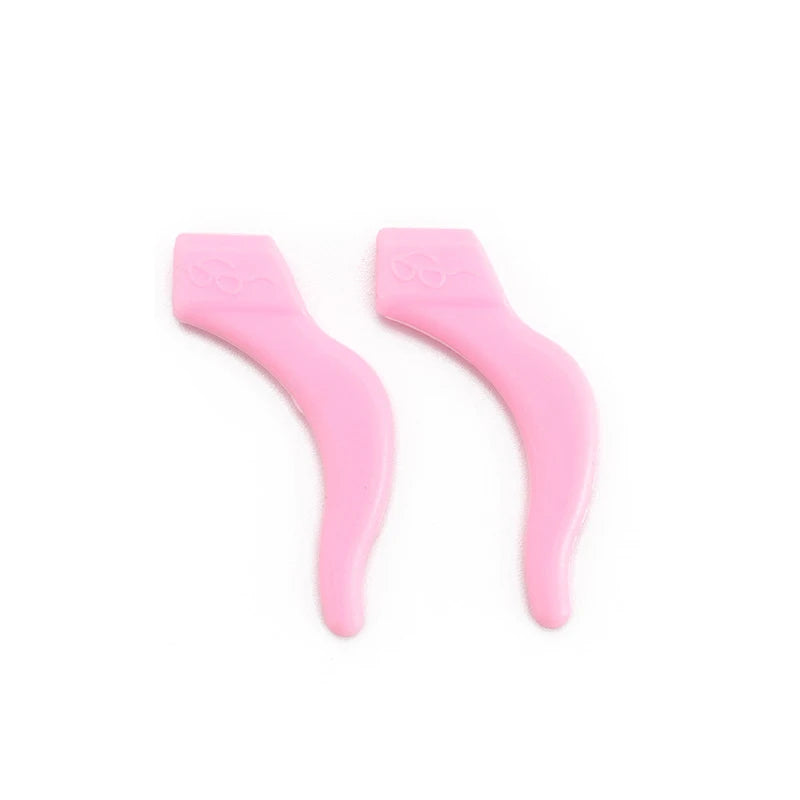 A pair of pink silicone ear hooks designed for sports and active use.