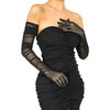 Un mannequin portant des gants de danse d'opéra noirs et une robe nuisette noire.