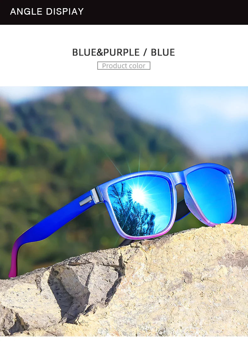 Blue and purple polarized sunglasses resting on a light-colored rock against a blurred green landscape.