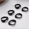 A collection of black silicone ear tips for true wireless earbuds, shown from various angles.