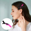 A woman is using a pink pointed tail hair comb and styling brush set on her hair.