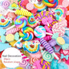 A colorful set of 10 kawaii resin nail art charms in various shapes and colors