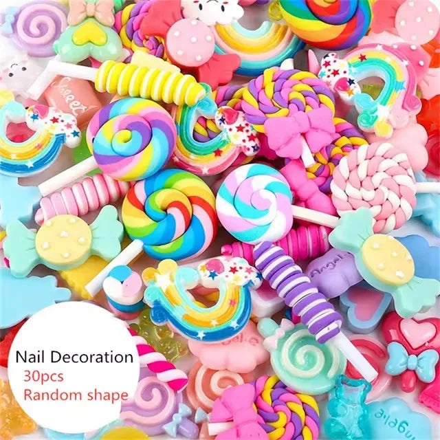 A colorful set of 10 kawaii resin nail art charms in various shapes and colors