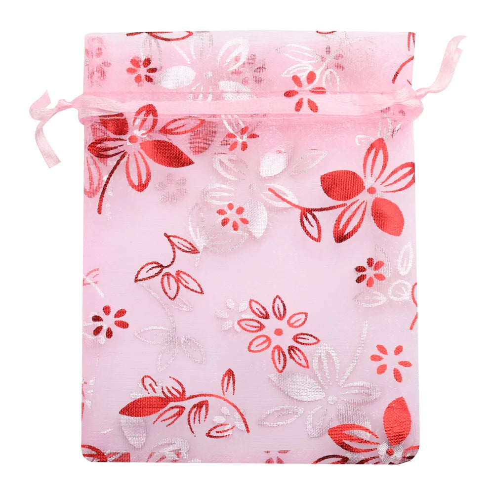 Pink sheer satin drawstring pouch with red floral embroidery for jewelry or gifts