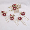 A set of five floral pearl bridal hair accessories featuring deep pink flowers and gold leaf accents.