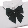 A black butterfly ribbon tie set displayed on a white dress shirt.