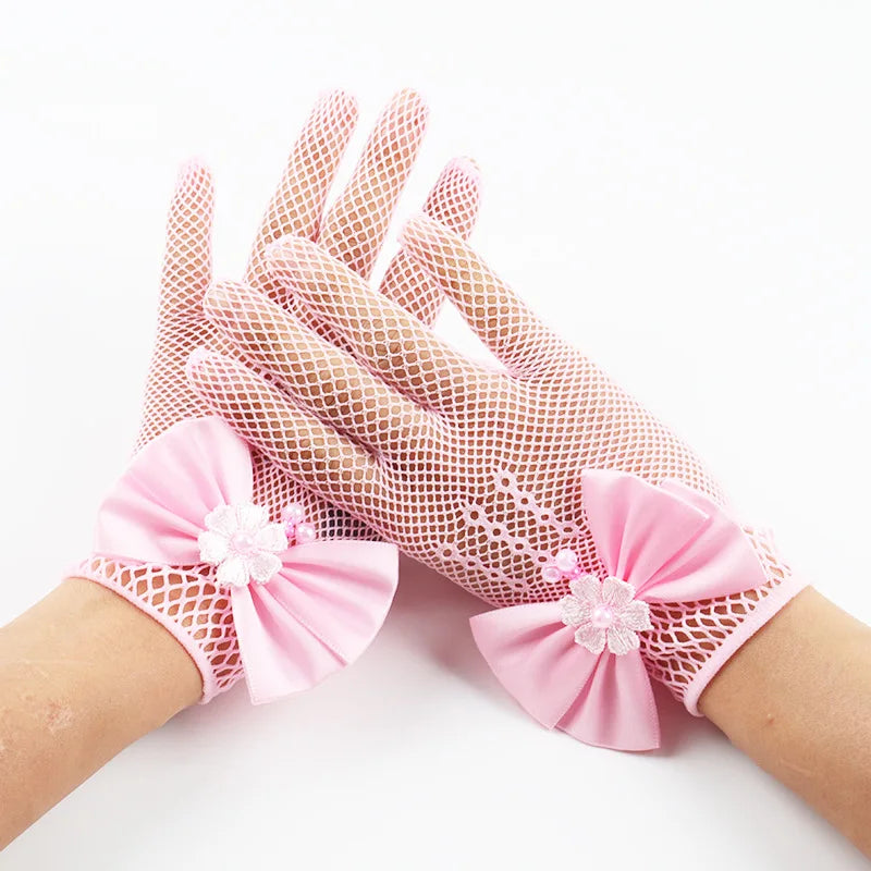 Pink bridal mesh finger gloves with floral accents displayed on a hand.