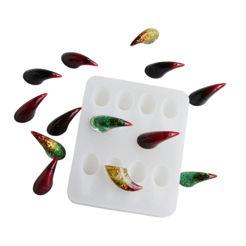 A silicone mold for crafting devil horns and claws, showing various colored silicone pieces.