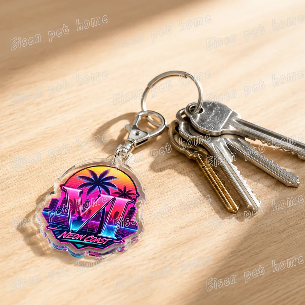 Silver keychains featuring a neon pink and purple palm tree design for Retro Vice City fans