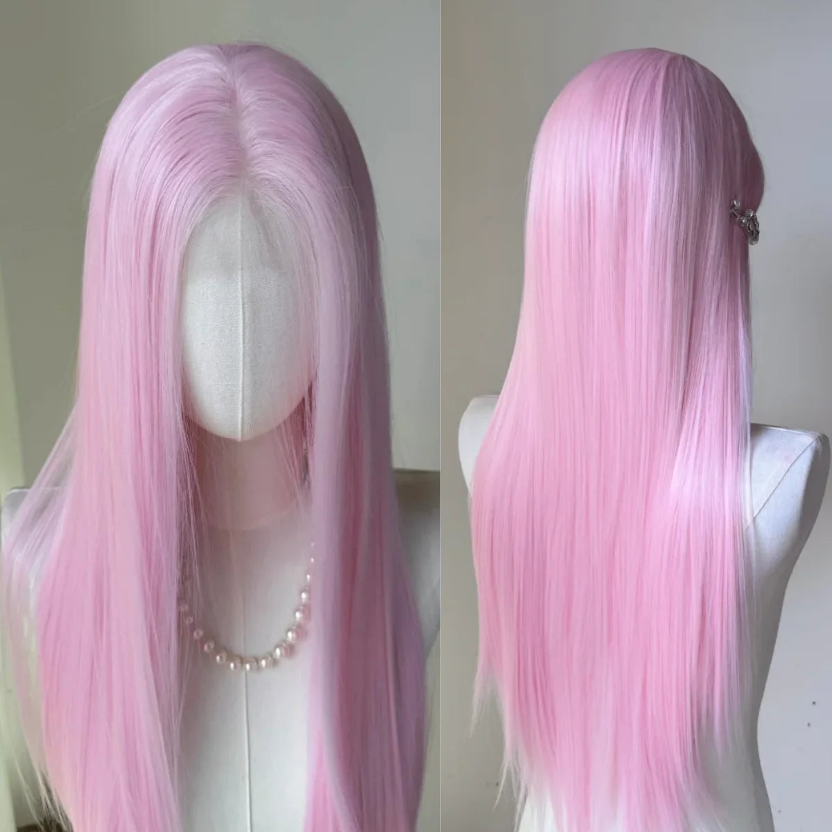 A long straight pink wig displayed on a mannequin, showing the hair from the front and back.